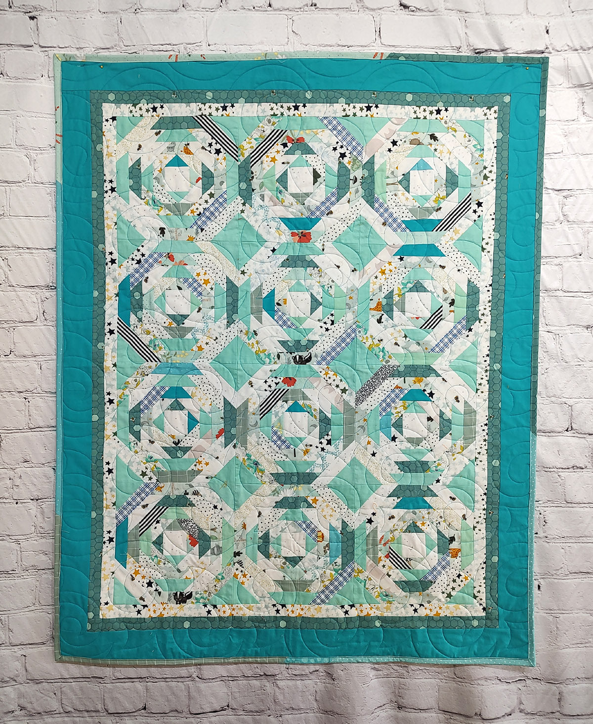 Turquoise and White print scrappy baby boy pineapple lap quilt