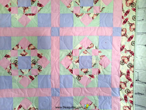 First Steps girl on a bike baby quilt