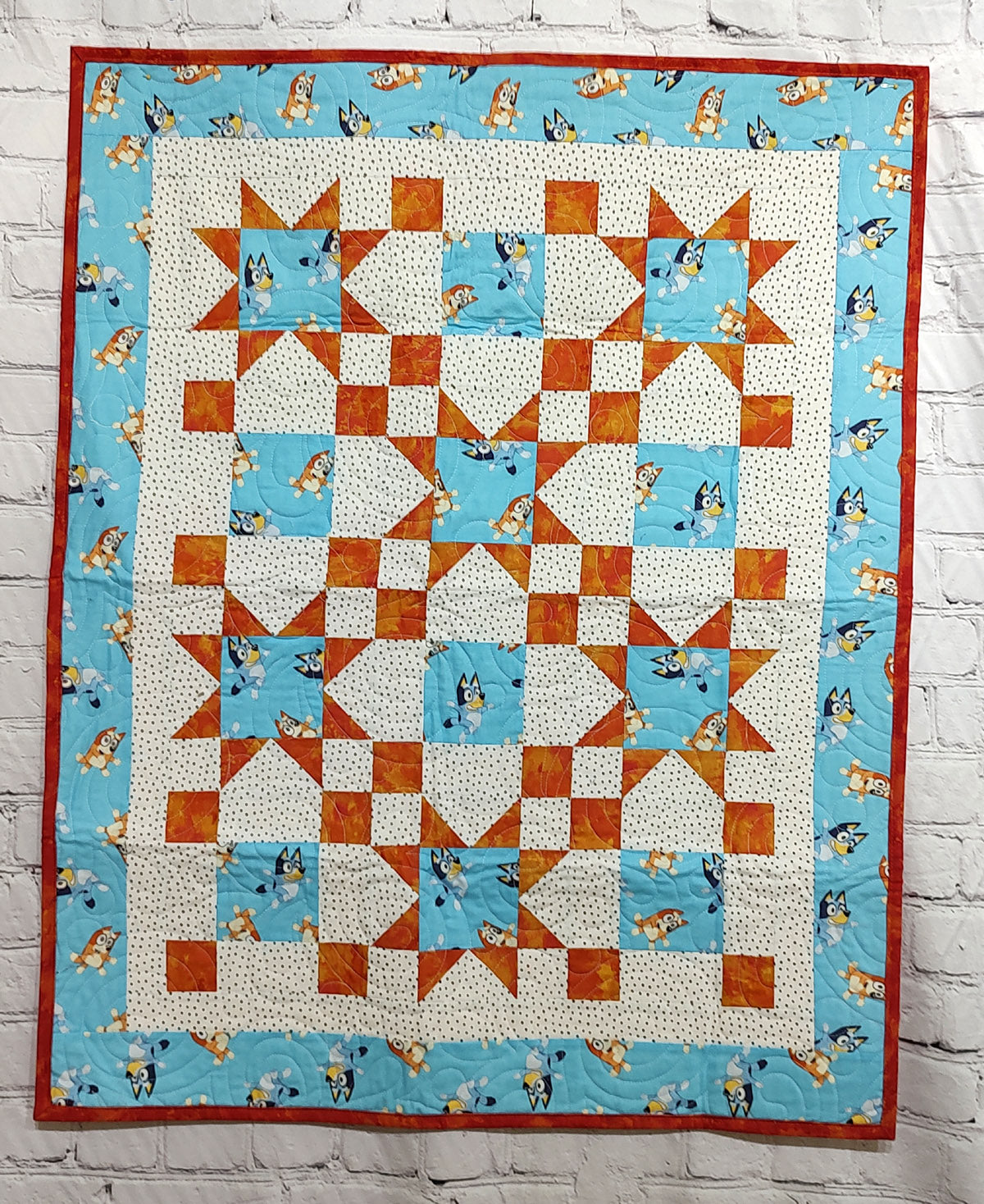 Crazy Dogs Bluey Blue and orange baby quilt