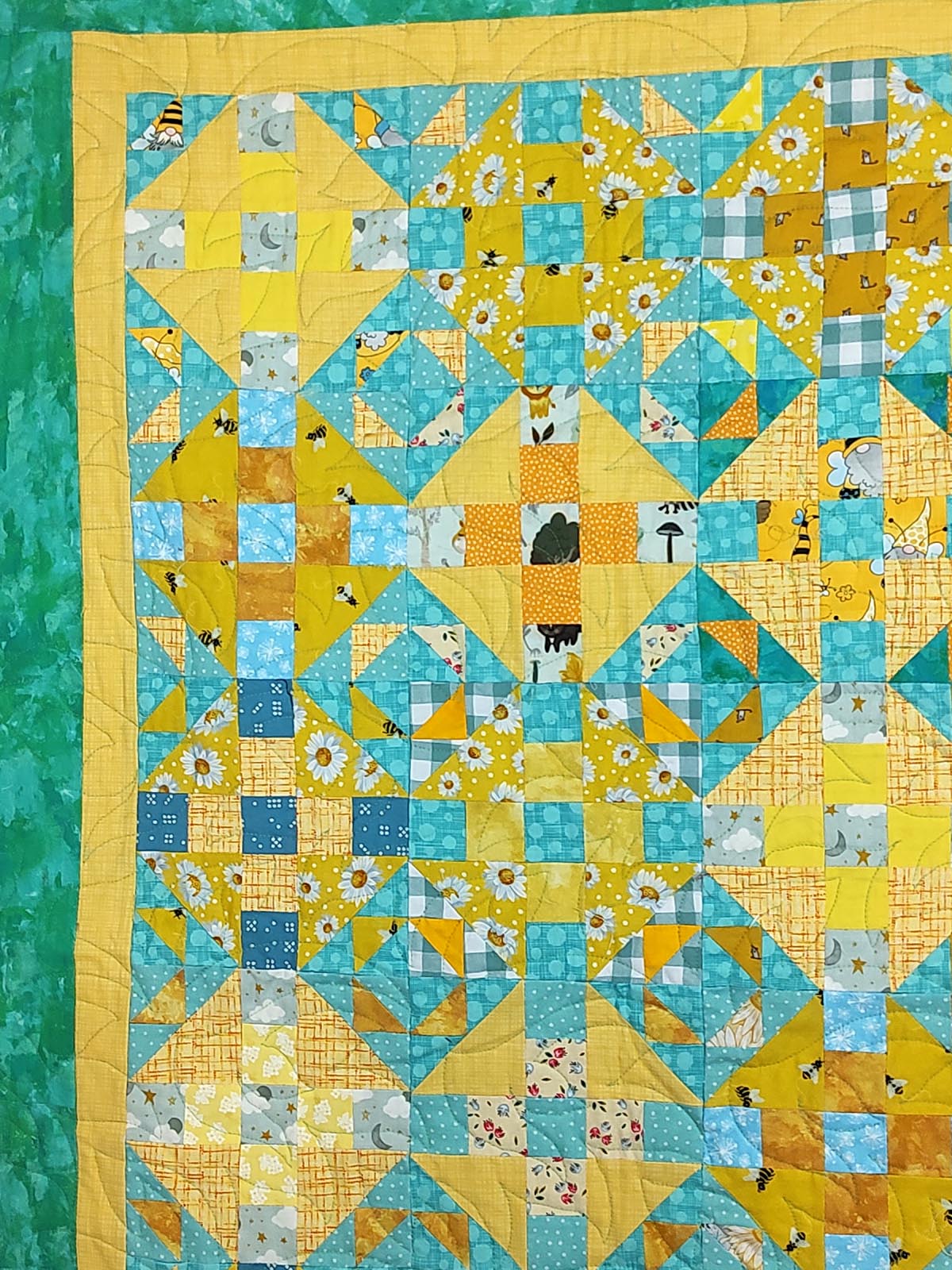 Turquoise and Yellow scrappy Duck Duck Goose baby quilt