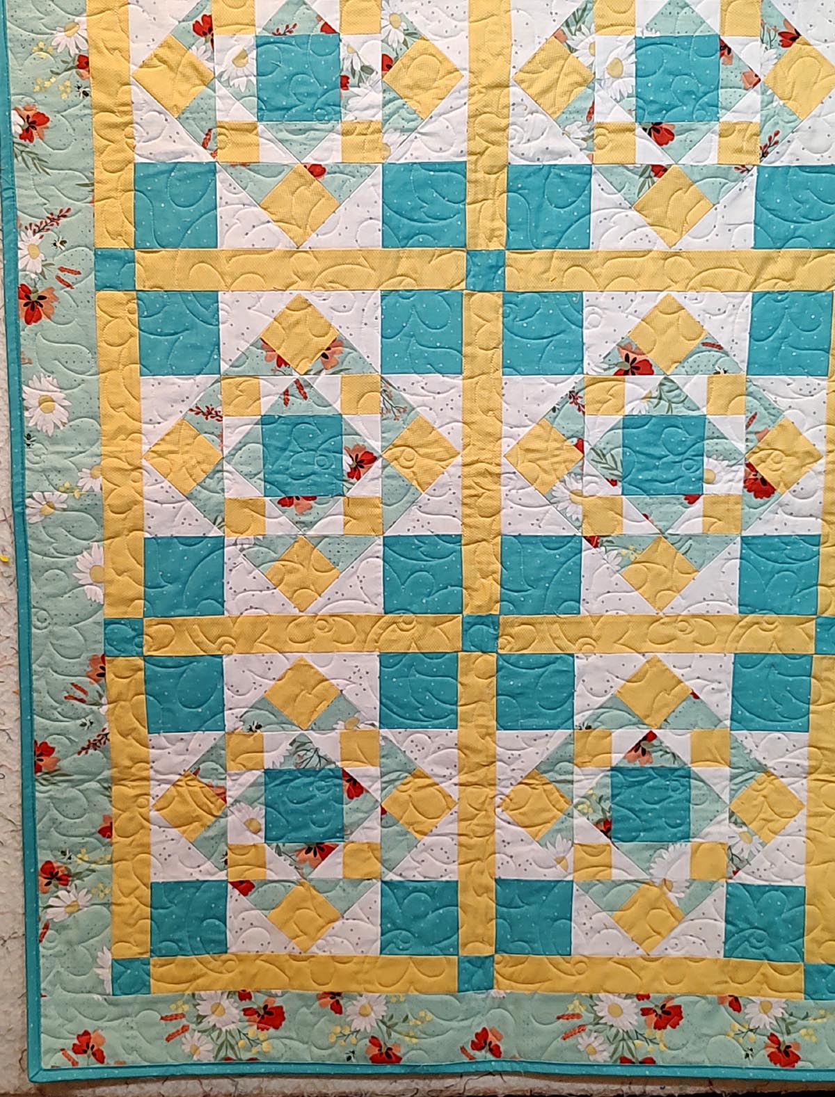 First Steps floral turquoise and yellow baby quilt