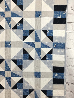 Blue and grey Modern Moth Fragility baby lap quilt