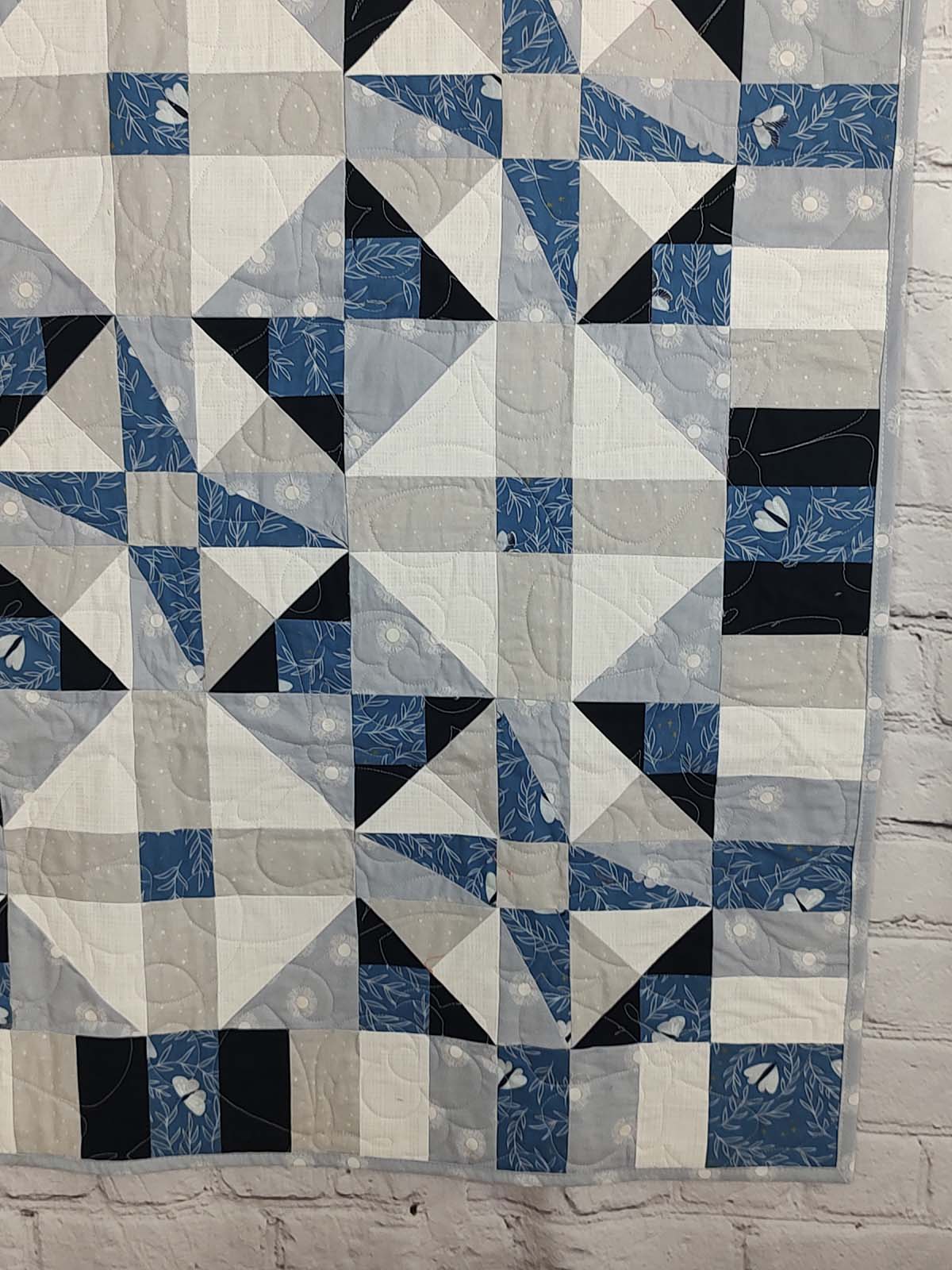 Blue and grey Modern Moth Fragility baby lap quilt