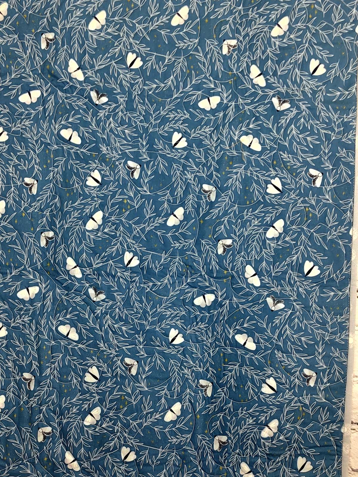 Blue and grey Modern Moth Fragility baby lap quilt
