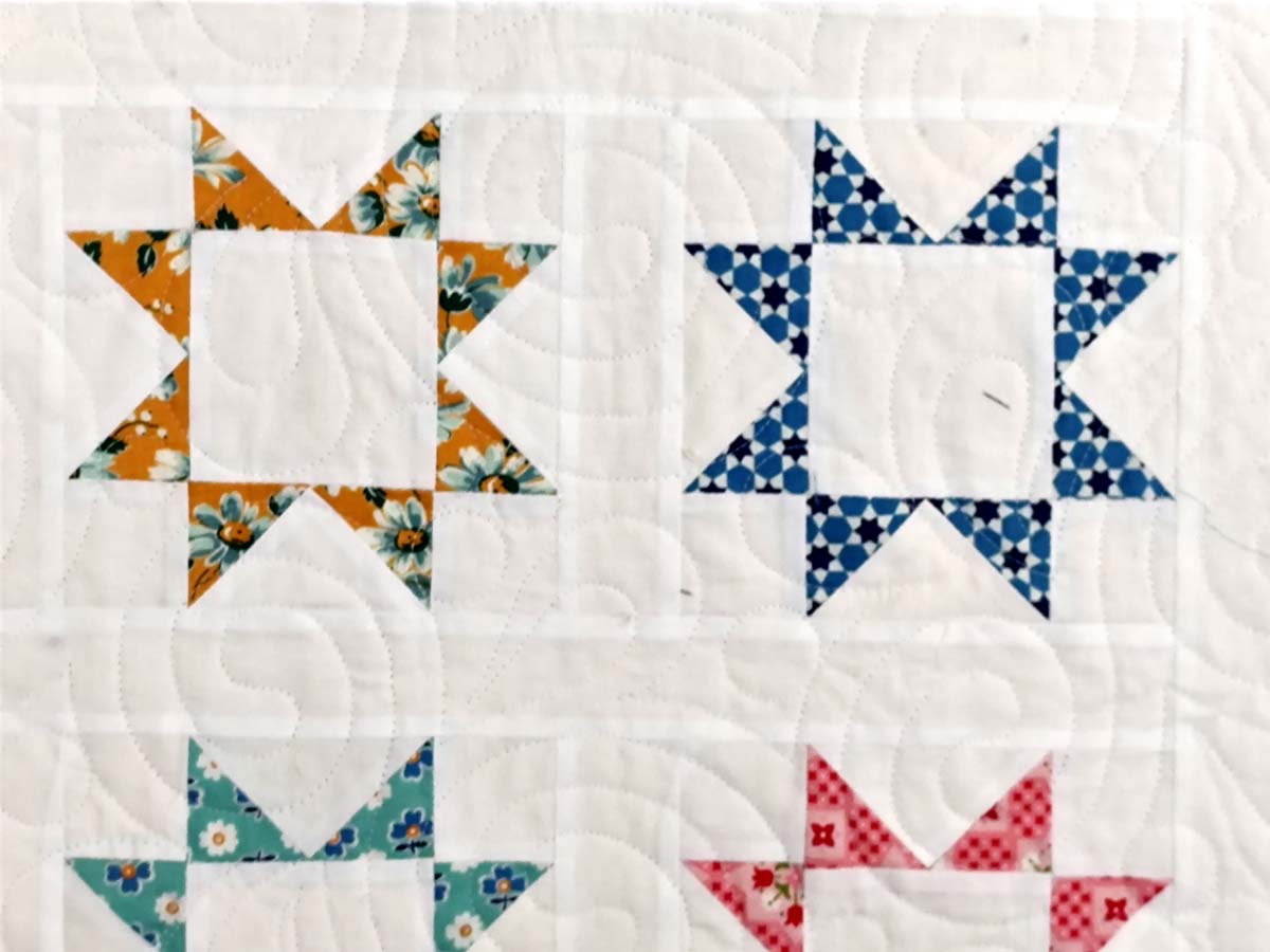 Stars Aligned Modern antique print baby quilt