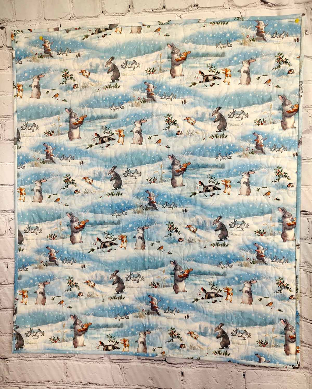 Snow Bunny blue and tan baby quilt