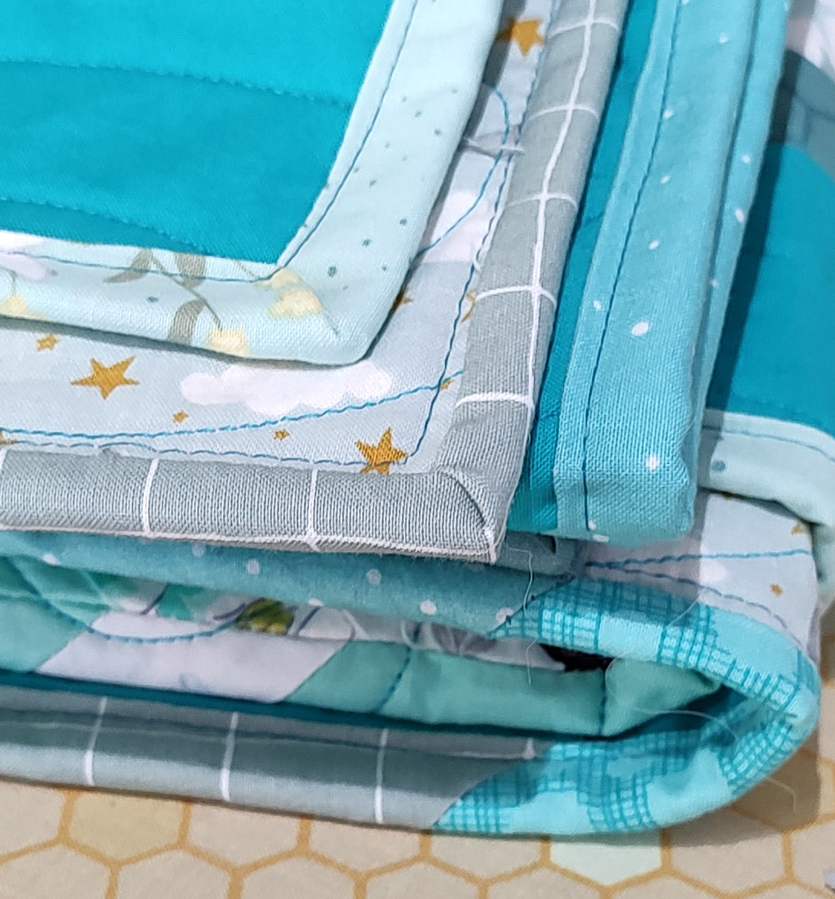 Turquoise and White print scrappy baby boy pineapple lap quilt