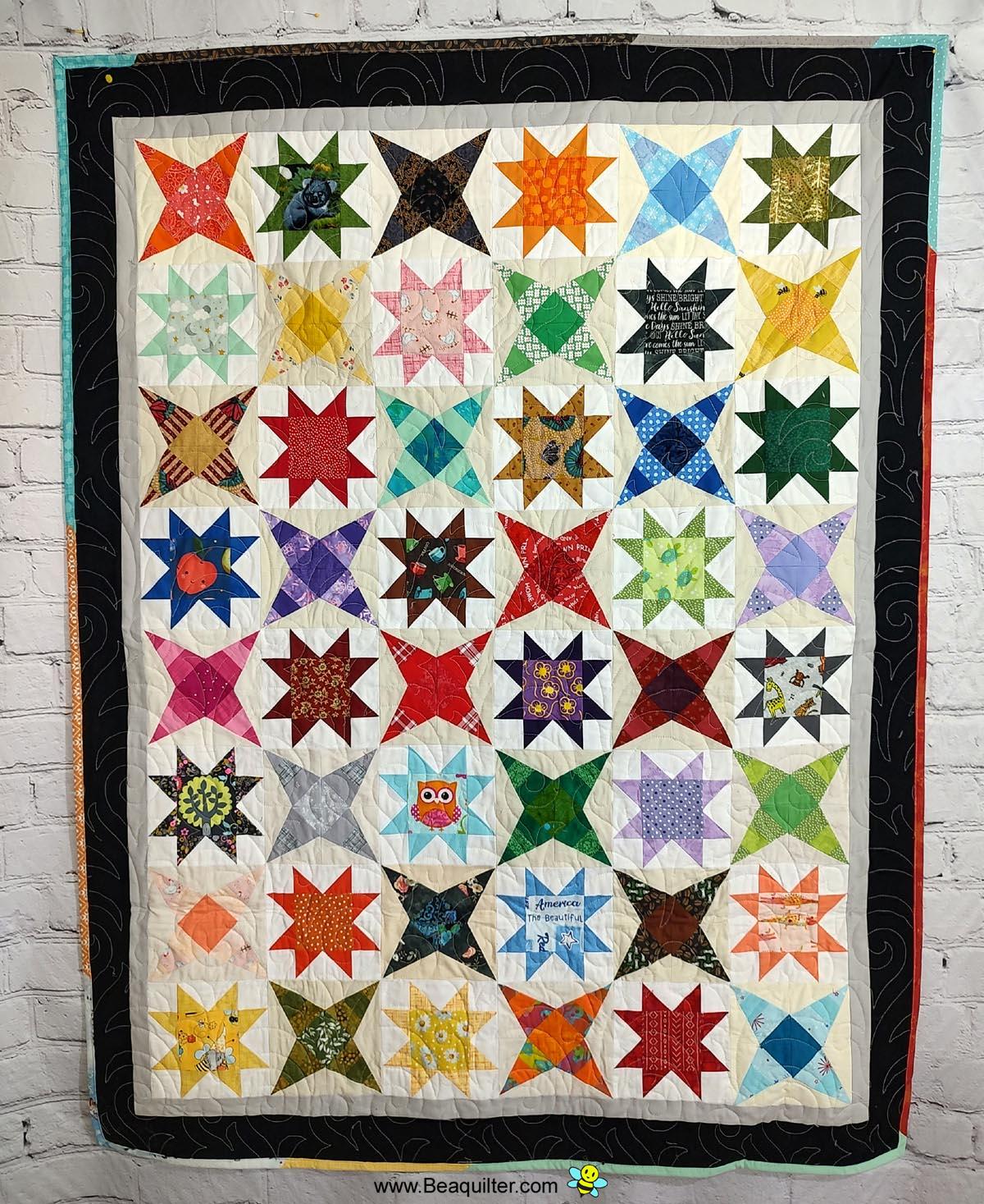 Priscilla and Stars scrappy lap quilt