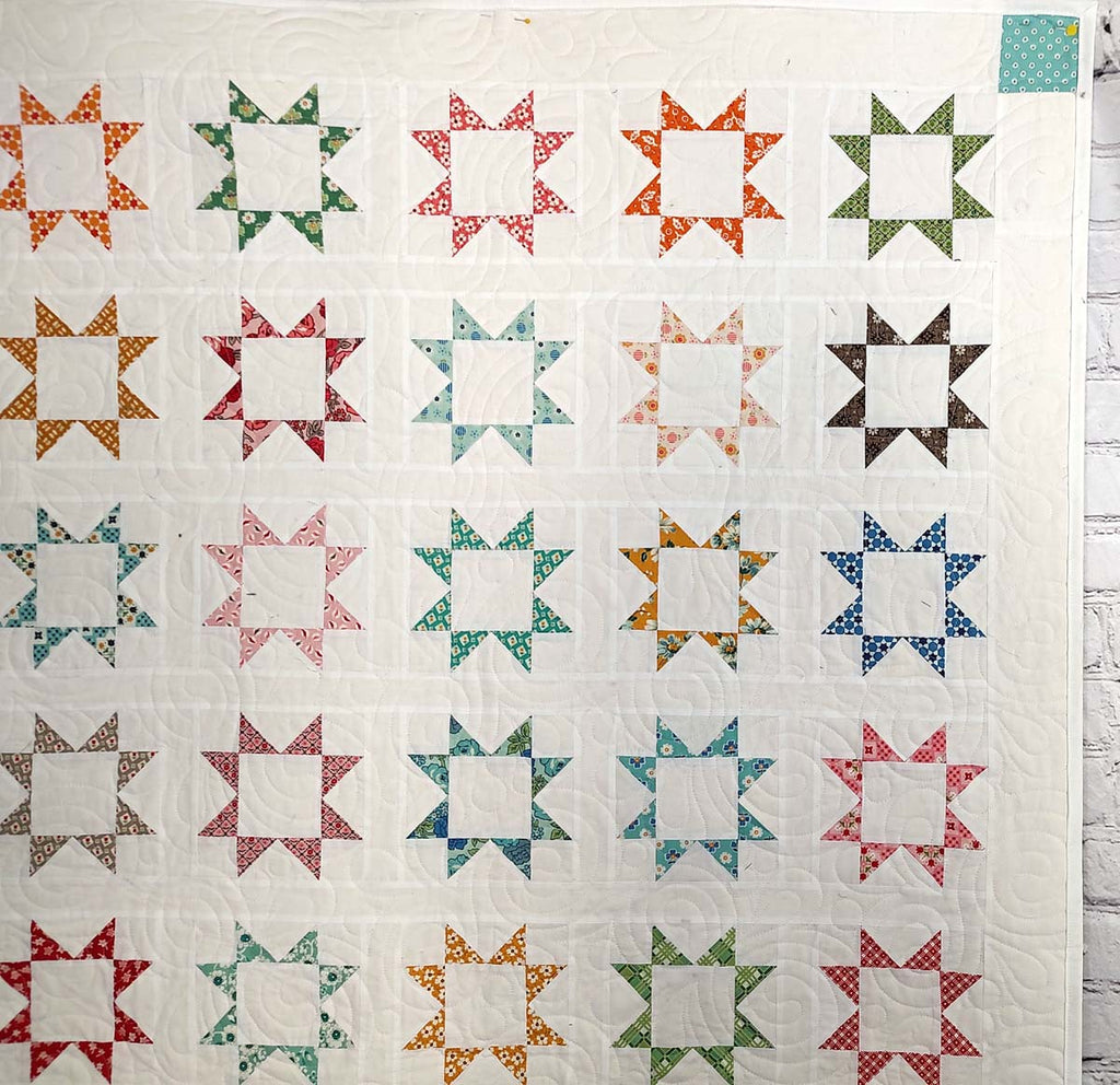 Stars Aligned Modern antique print baby quilt