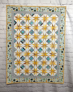 Super Nova scrappy jungle yellow and turquoise Baby Lap quilt