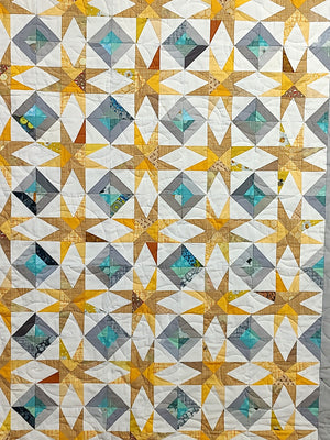 Super Nova scrappy jungle yellow and turquoise Baby Lap quilt