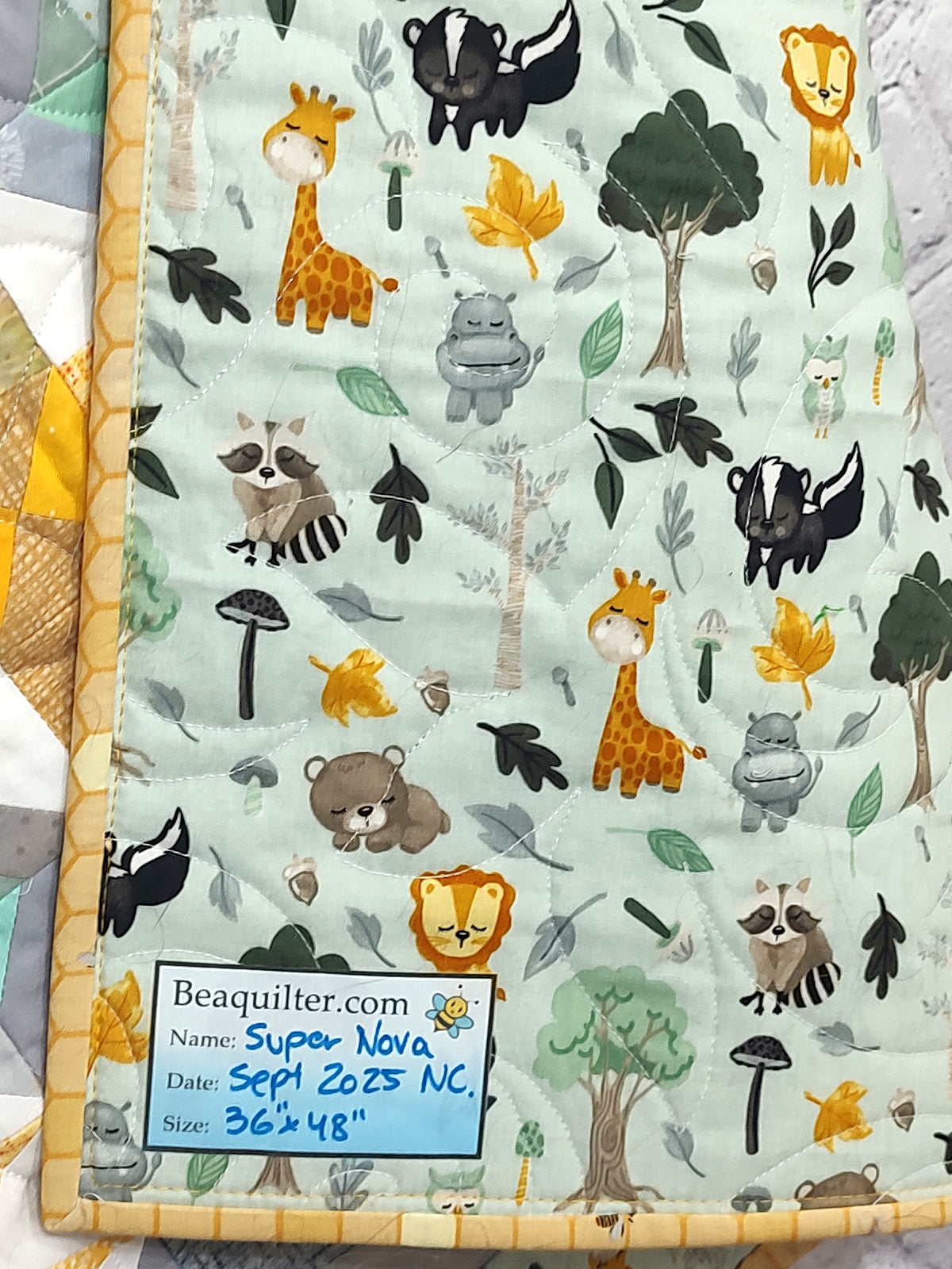Super Nova scrappy jungle yellow and turquoise Baby Lap quilt